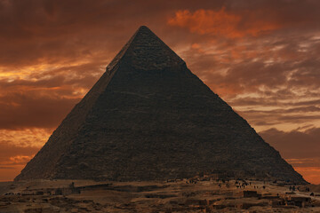 Egyptian pyramid of Pharaoh Khafre under a disturbing sky on the Giza plateau
