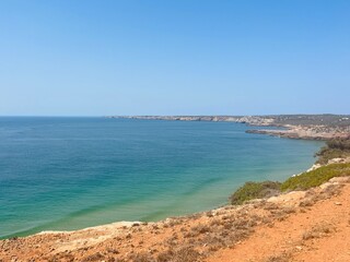 rocky coast of the ocean, rocks at the ocean beach, ocean horizon