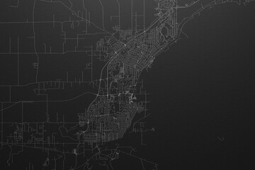 Street map of Thunder Bay (Canada) on black paper with light coming from top