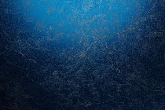 Street map of Stuttgart (Germany) engraved on blue metal background. View with light coming from top. 3d render, illustration