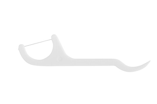 Disposable toothpick with dental floss on a plastic base on a blank background.