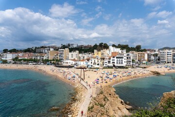 Fototapeta na wymiar Scenic view of hotels on then green coastline on a sunny day