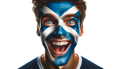 man soccer fun portrait with painted face of scottish national flag isolated on transparent background