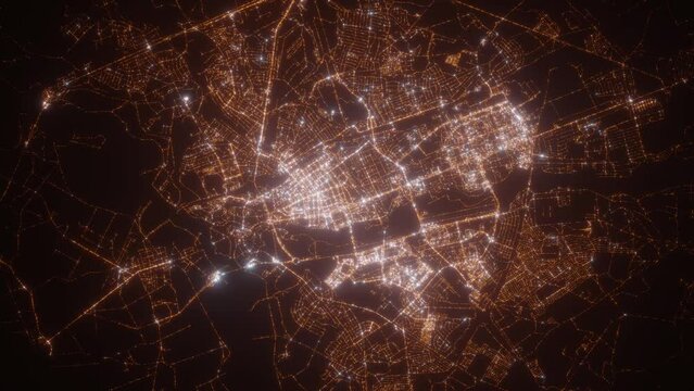 Brest (Belarus) aerial view at night. Top view on modern city with glow effect. Camera is zooming out, rotating counterclockwise