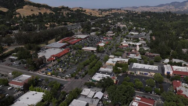 Aerial view of Oakland highway with town view on a sunny day, time lapse