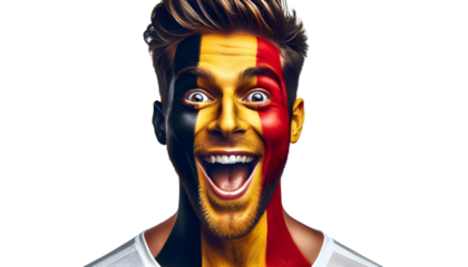 man soccer fun portrait with painted face of belgian national flag isolated on transparent background