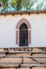 Vertical of a window frame of an old church