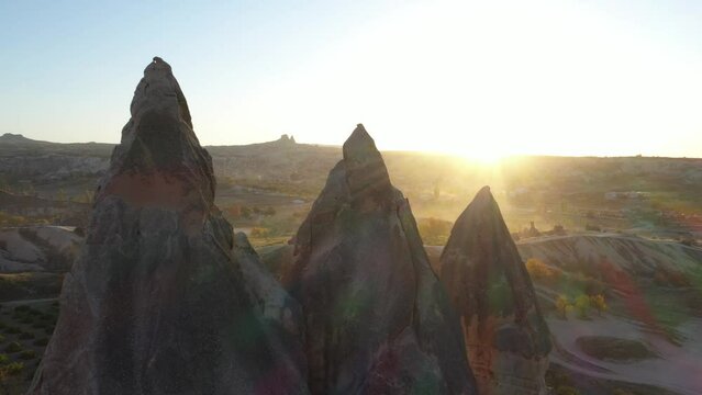 Drone landscape scene of Fairy chimney and the mountain in Cappadocia Goreme Turkey at sunset