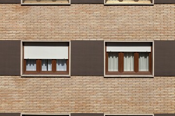 Minimalist photograph of a window on the side of European style buildings