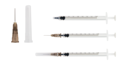 Set of insulin syringes, needle, cap on a blank background.