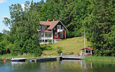 Fototapeta na wymiar Sweden, picturesque house on a little island near Stockholm