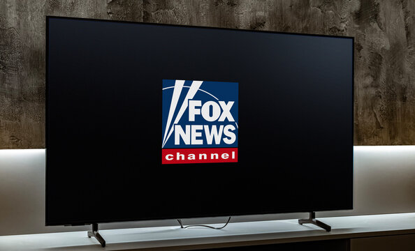 Flat-screen TV set displaying logo of Fox News