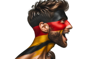 man soccer fun profile portrait with painted face of german national flag isolated on transparent background