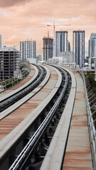 Fototapeta premium Architecture of the city of Miami and railway track in the south of the United States