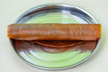 Aam papad is an Indian fruit leather made out of mango pulp mixed with concentrated sugar solution...
