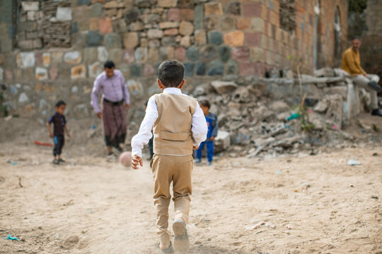 Child playing in Taiz, Yemen