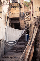 Fototapeta na wymiar Historic Alleyway with Hanging Textile in city of Taiz, Yemen
