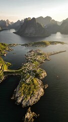 Stunning aerial view of the Lofoten Islands in Norway with rolling hills and vibrant buildings