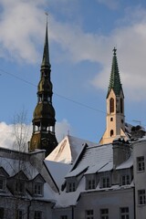 Obraz premium Grand medieval building, St Peter church, stands prominently in the city of Riga, Latvia
