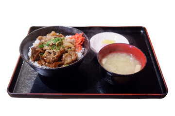 The pork rice bowl set includes soup.