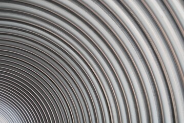 Close-up of spiral pipes texture