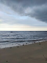 Fototapeta na wymiar Scenic view of a beach during cloudy weather