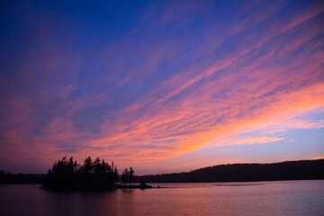 Fototapeta na wymiar Beautiful view of a tranquil lake at sunset