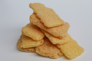 Rice crackers with powder flavoring, isolated on white background