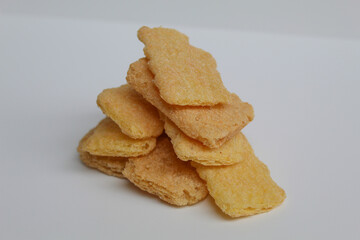 Rice crackers with powder flavoring, isolated on white background