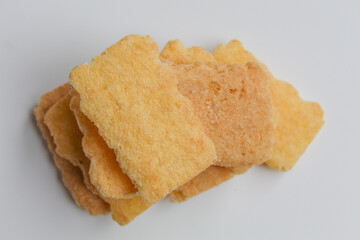 Rice crackers with powder flavoring, isolated on white background