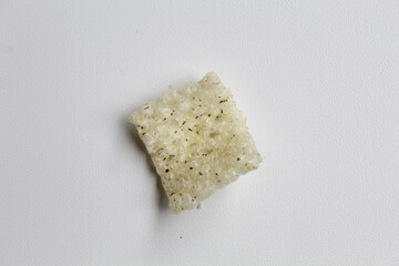 Crackers in net shape, isolated on white background