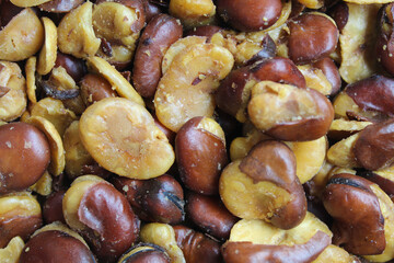 Kacang koro, or jack bean. Cooked and served with salt. Indonesian snack