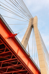 Fototapeta premium Cable-stayed bridge at sunset against a beautiful sky. Moore. Russia.