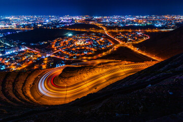 View from the top on wavy road in Muscat at night