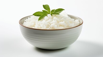 Obraz na płótnie Canvas White Bowl Filled With Rice and Green Leaf