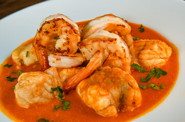 Recipe for Armorican-style monkfish tail, prawns, flambees with cognac, High quality photo