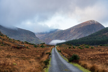 Fototapeta na wymiar Road through the amazing Black Valley, also know as Cummeenduff, in County Kerry, Ireland.