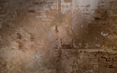 Old wall textured background with cracks.