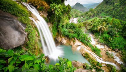 Fototapeta na wymiar Travel destination of a scenic waterfall landscape on a tropical vacation