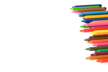 Crayons lined up isolated on white background.