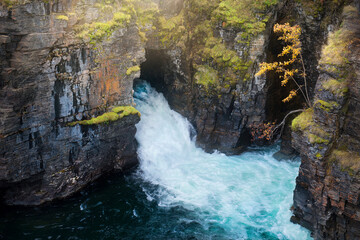 Waterfall in Abisko nationalpark in Sweden - obrazy, fototapety, plakaty