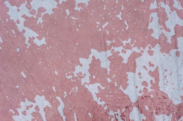 Background, texture of wet oilcloth, tarpaulin in ice, with drops of water, snow on a red surface. Close-up photography, top view, abstraction.