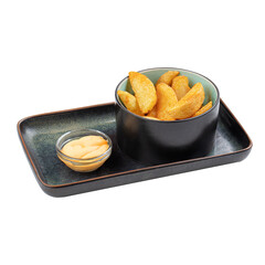 Portion of potato wedges with cheese sauce