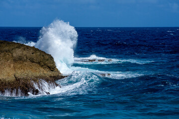 waves crashing on rocks