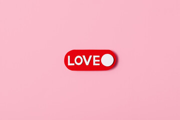 Word love on pink background. Love and Valentines Day concept