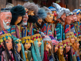 Naklejka premium Collection of hand made colorful dolls on traditional Uzbek dress in local market, Khiva, Uzbekistan