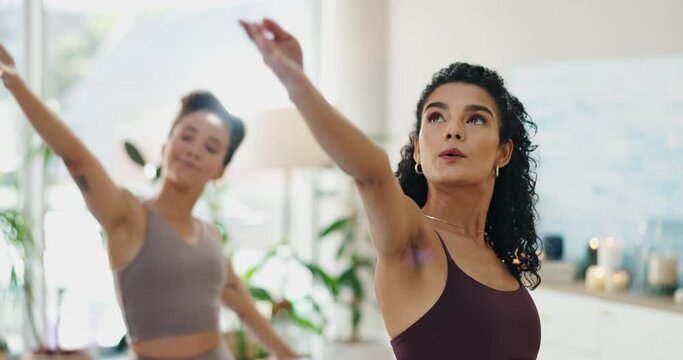 Women, friends and yoga in home fitness, holistic wellness and workout for health and harmony. Young people or personal trainer in warrior pose for balance, stretching and exercise with lens flare