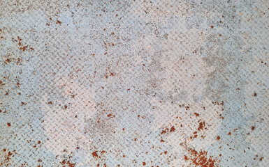 bown rusty on grey checkered steel plates texture, old anti slip floor background. abstract rusty...