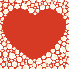 Pop corn heart. Blank place for text in the middle. Different size and shape of popped corn kernels. Red background. Square composition. Movie premier, cinema date concept.