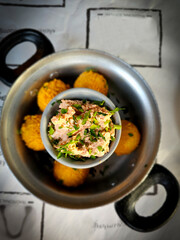 Fried mozzarella, cheddar cheese bites, balls and garnish